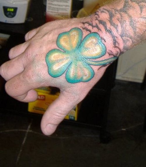 Green Ink Leaf Tattoo On Right Arm