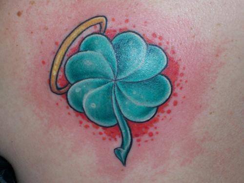 Blue Ink Four Leaf Tattoo