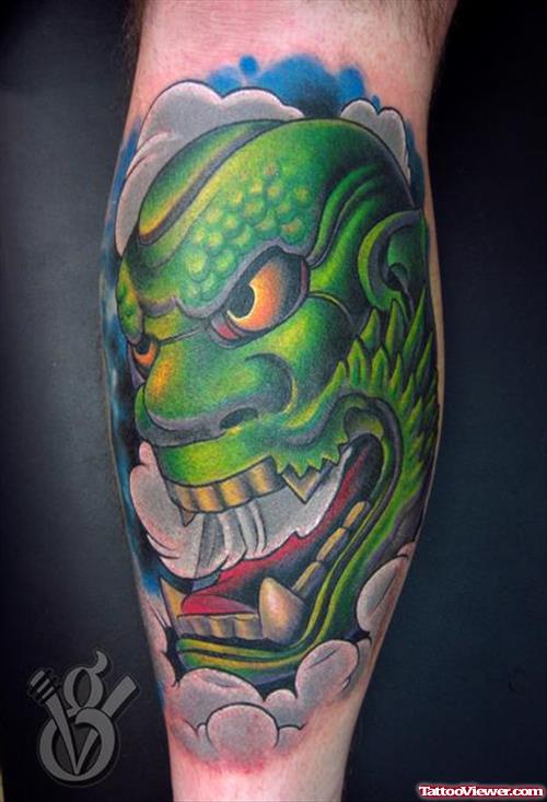Green Ink Japanese Hanya Mask Leg Tattoo