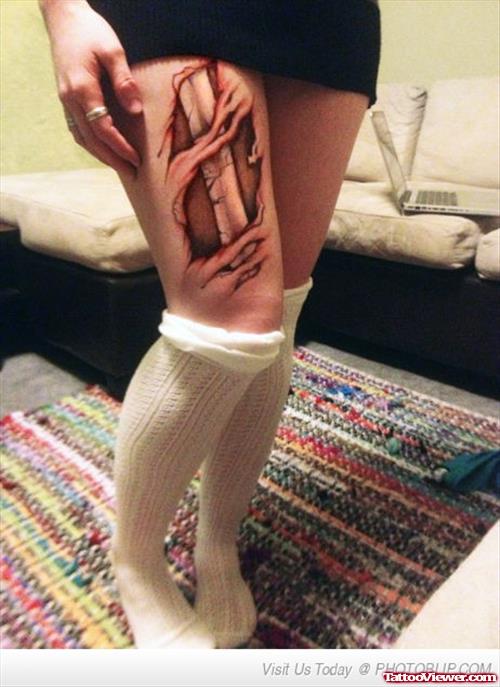 Ripped Skin Leg Tattoo For Girls