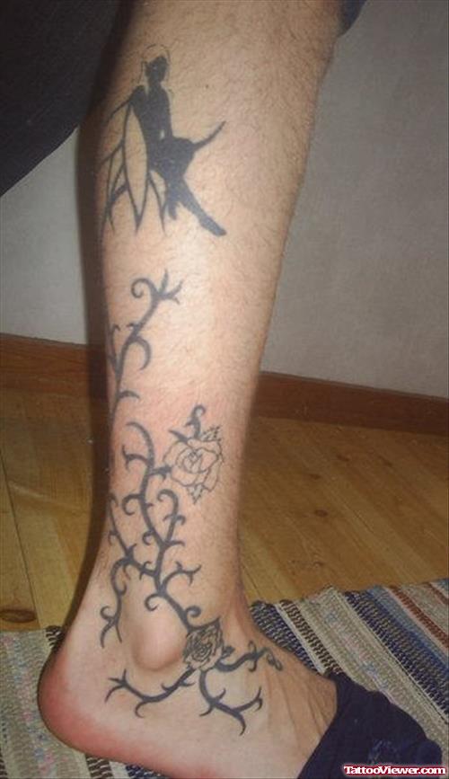 Rose Flowers And Tribal Leg Tattoo