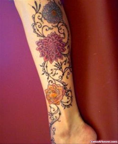 Colored Flowers Leg Tattoos
