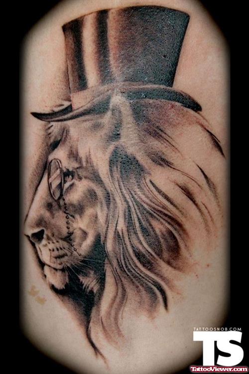 Grey Ink Lion Head With Hat Tattoo