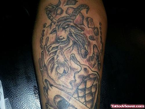 Grey Ink Goat Head Leg Tattoo