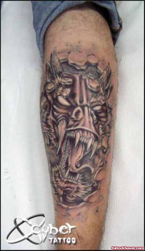 Grey Ink Devil Leg Tattoo