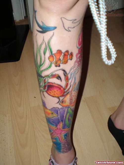 Attractive Colored Sea Creatures Leg Tattoo