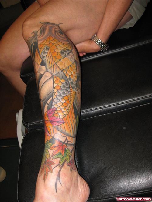 Colored Flowers And Koi Leg Tattoo