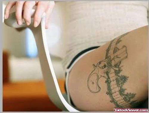 Grey Ink Gun And Garter Lace Leg Tattoo