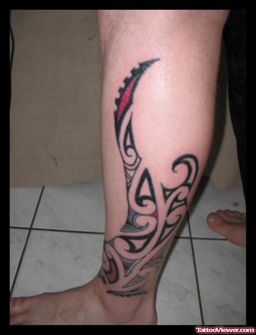 Amazing Tribal Left Leg Tattoo
