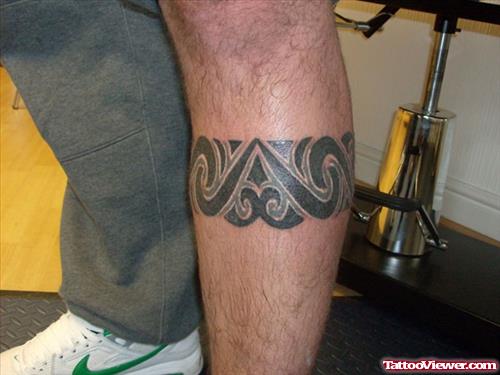Amazing Black Tribal Leg Tattoo