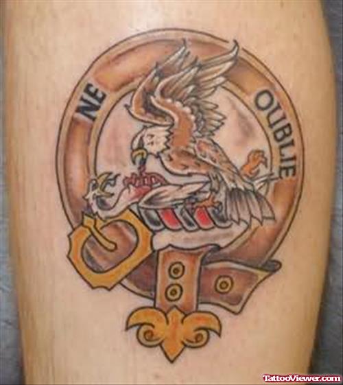 Logo Family Crest Tattoo On Leg