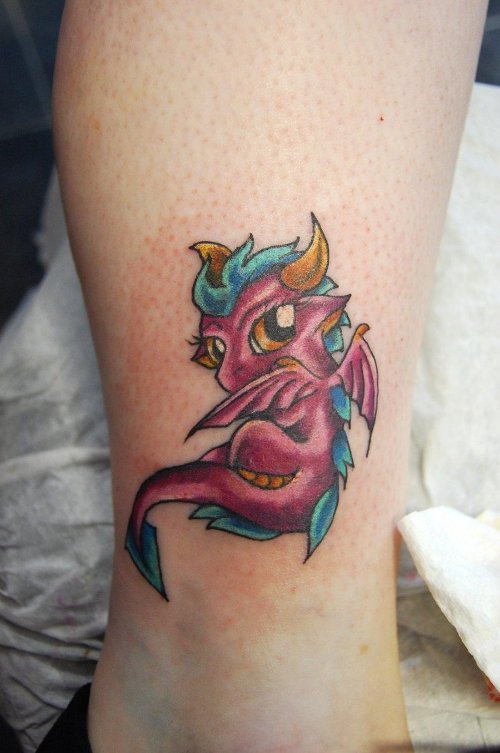 Colored Ink Devil Bird Leg Tattoo