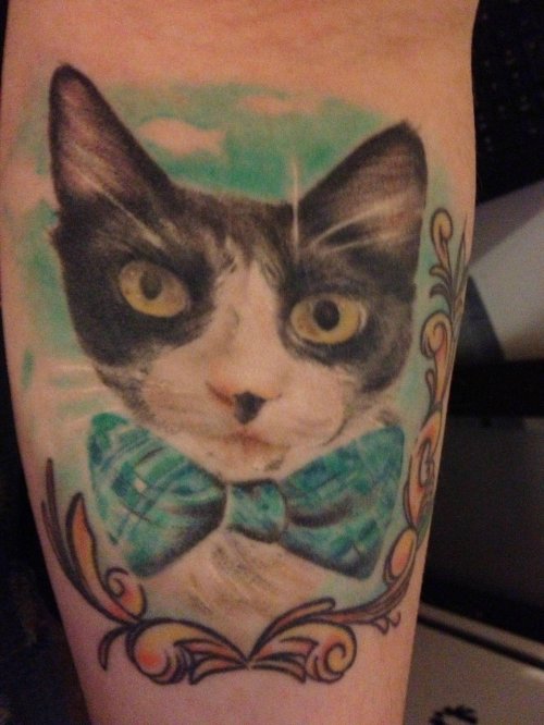 Grey Ink Cat Head Leg Tattoo