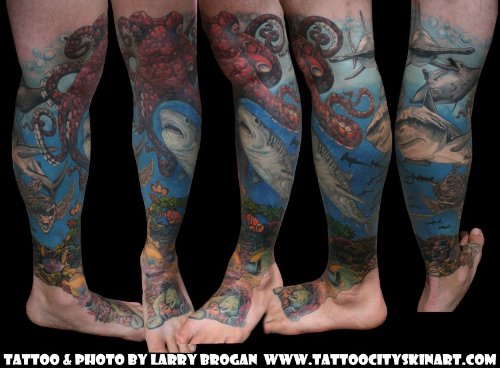 Colored Octopus And Shark Leg Tattoo
