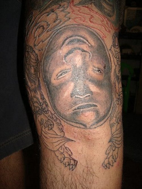 Grey Ink Buddha Head Leg Tattoo