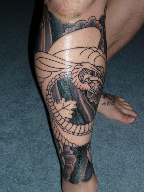 Grey Ink Leg Tattoo
