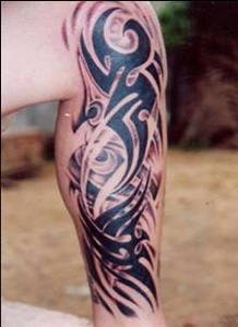 Beautiful Black Ink Tribal Leg Tattoo