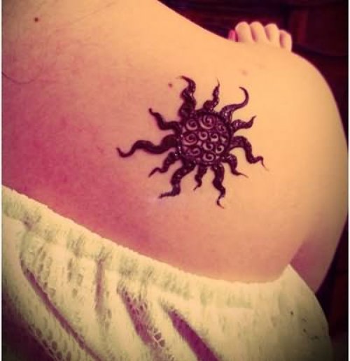 Tribal Sun Leo Tattoo On Back Shoulder