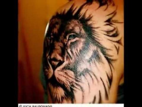 Nice Grey Leo Tattoo On Shoulder