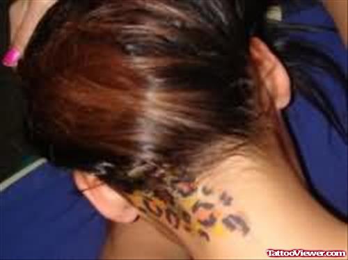 Leopard Print Tattooed on Neck