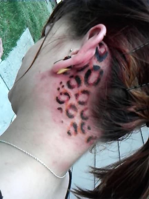 Leopard Spots Tattoo by Tattoostime