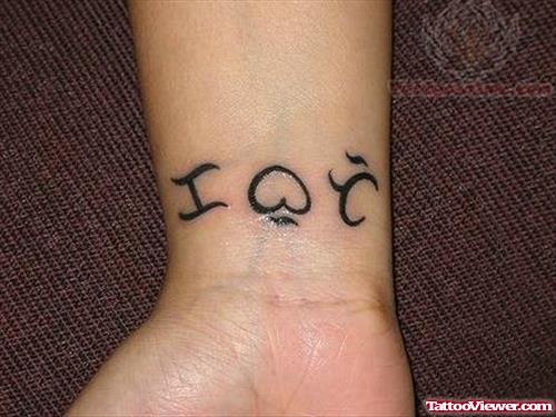 Love Lettering Tattoo On Wrist