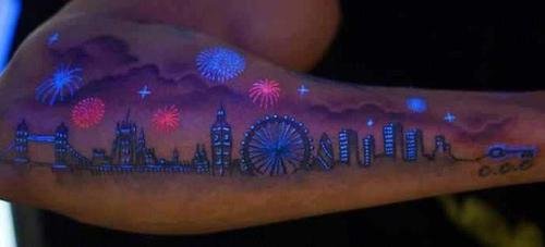 Colored Light Tattoo On Man Right Sleeve