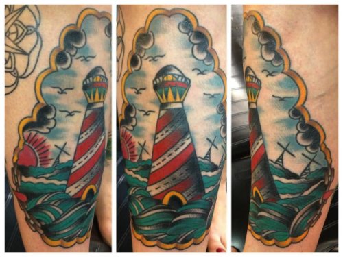 Color Ink Lighthouse Tattoo On Man Leg