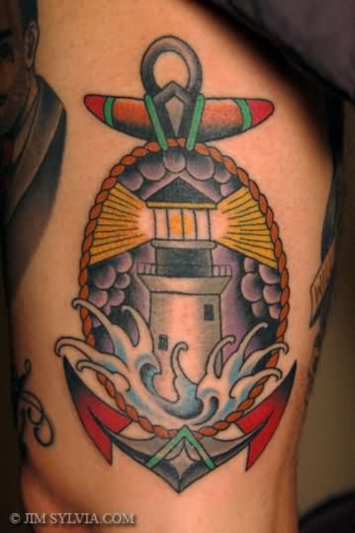 Anchor and Lighthouse Tattoo On Leg