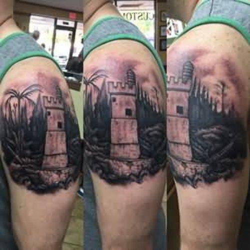 Man Left Shoulder Lighthouse Tattoo
