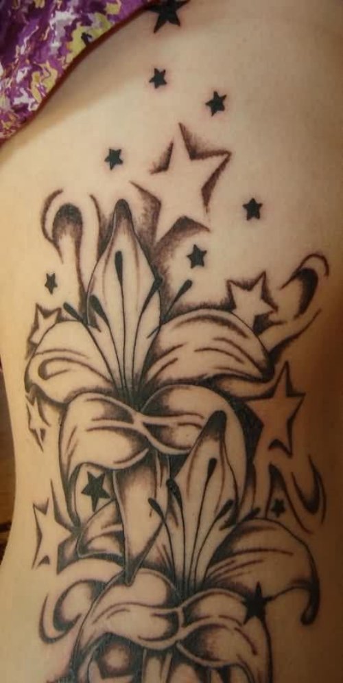 Grey Stars And Flowers Lily Tattoo
