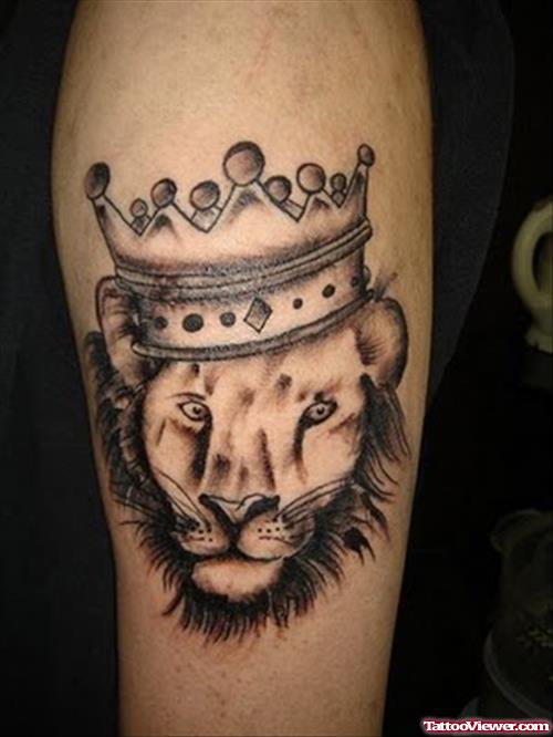 Grey Ink Crown Lion Head Tattoo