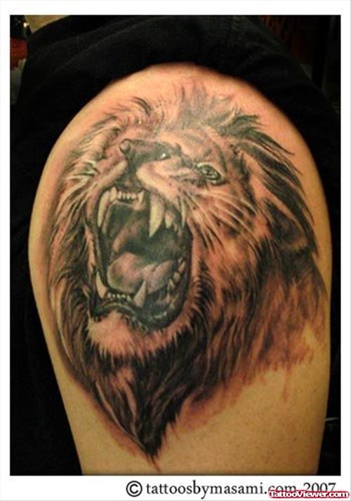 Grey Ink Lion Head Tattoos On Shoulder