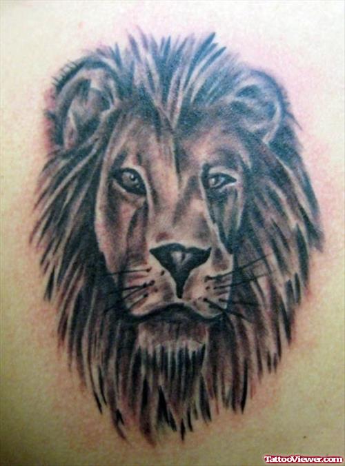 Grey Ink Lion Head Tattoo