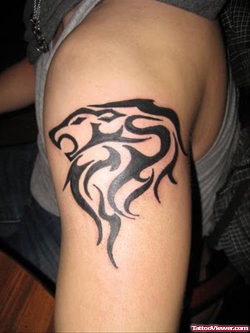 Awesome Tribal Lion Head Tattoo On Left Shoulder