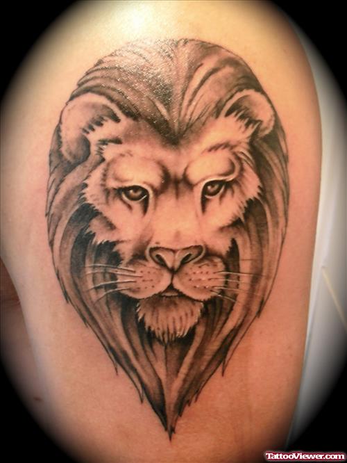 Awesome Grey Ink Lion Head Tattoo On Shoulder