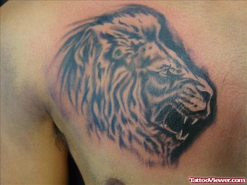 Grey Ink Lion Head Tattoo On Chest