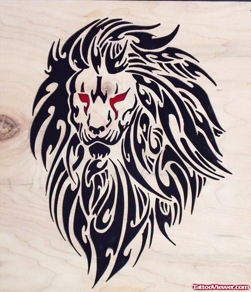 Attractive Red Eyes Tribal Lion Head Tattoo Design