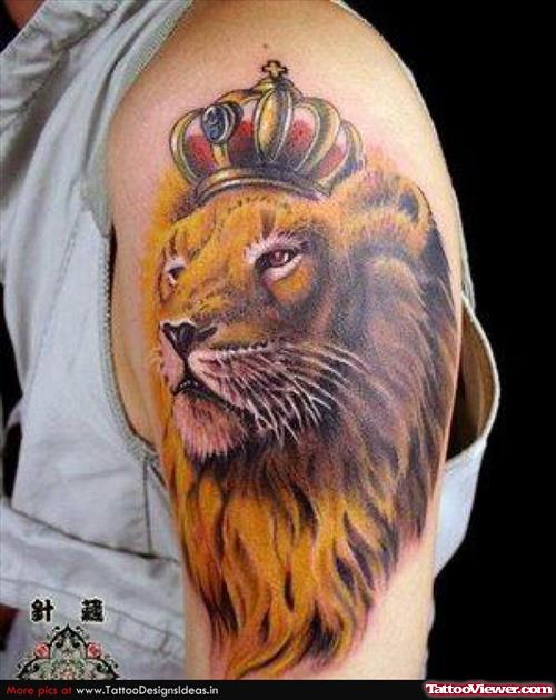 Colored Lion Head With Crown Tattoo