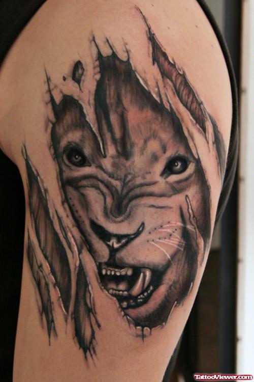 Ripped Skin Lion Tattoo