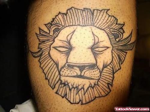Sleeping Lion Tattoo Design On Bicep