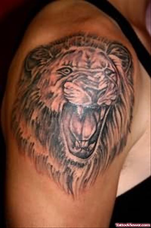 Roaring Lion Face Tattoo On Shoulder