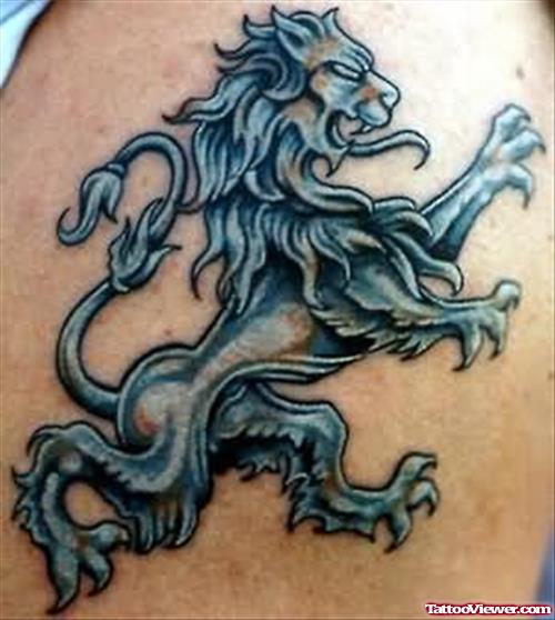 Lion Tattoo On Muscle