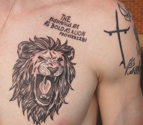 Grey Ink Lion Tattoo On Man Chest