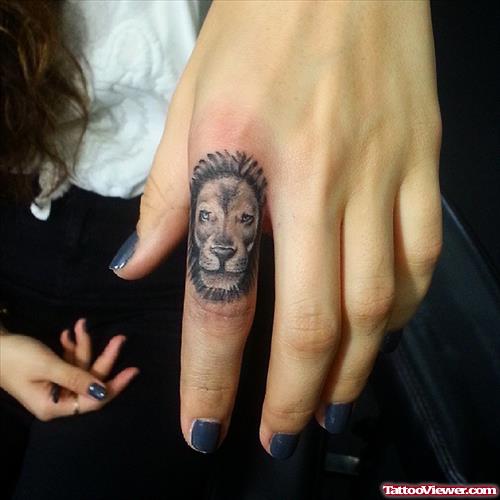 small lion tattoo