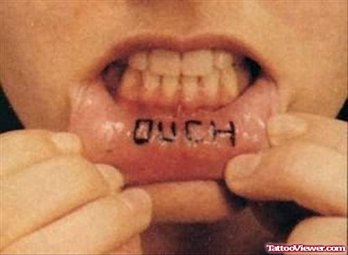 OUCH Tattoo On Lip