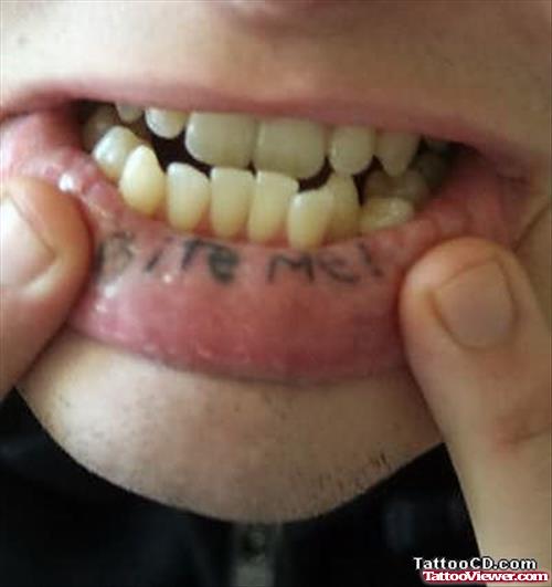 Bite Me Tattoo On Inner Lip