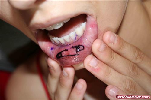 Safety Pin Tattoo On Lip
