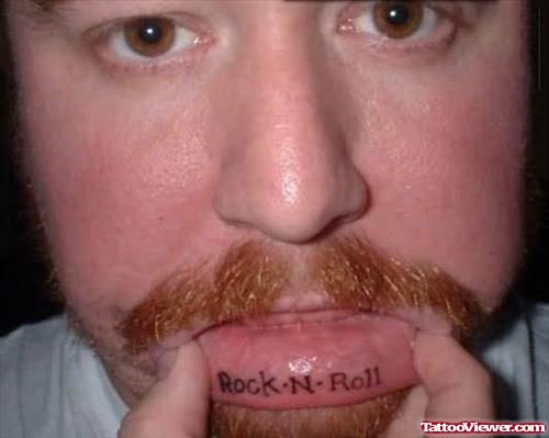 Rock N Roll Tattoo On Lip