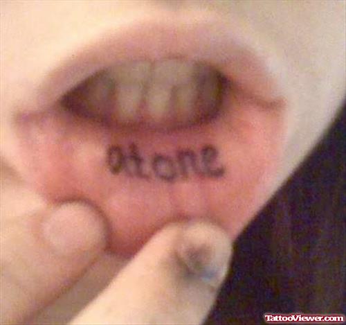 Atone Tattoo On Lip